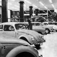 D'leteren showroom 1967. Two 1500 Sports' in foreground with mach 1 style 1500 SPORT badging. From D'leteren News No. 24, July 1967.