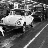 Courtesy Pete Frost. 10 January 1980: The last Beetle Cabriolet at the Karmann factory in Osnabru00fcck, a U.S. specification 1.6-litre fuel-injected model in Alpine White. The export sheet with UB on the inside of the windshield indicates the car is headed for Boston, Massachusetts.