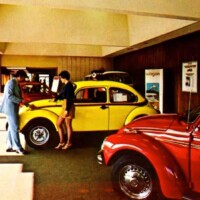 Carters VW Dealership, Seattle. Red car in foreground has Brazilian produced chrome wheels. and unidentified side stripe kit