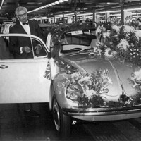 Major Ivan Hirst accepts the car on behalf of VW (GB) from the production line. 14 Millionth Wolfsburg